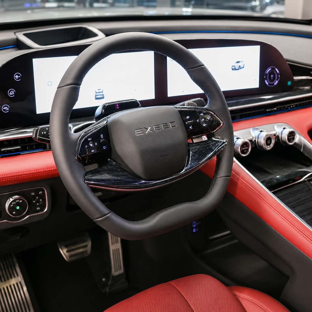 Close-up of car steering wheel and dashboard